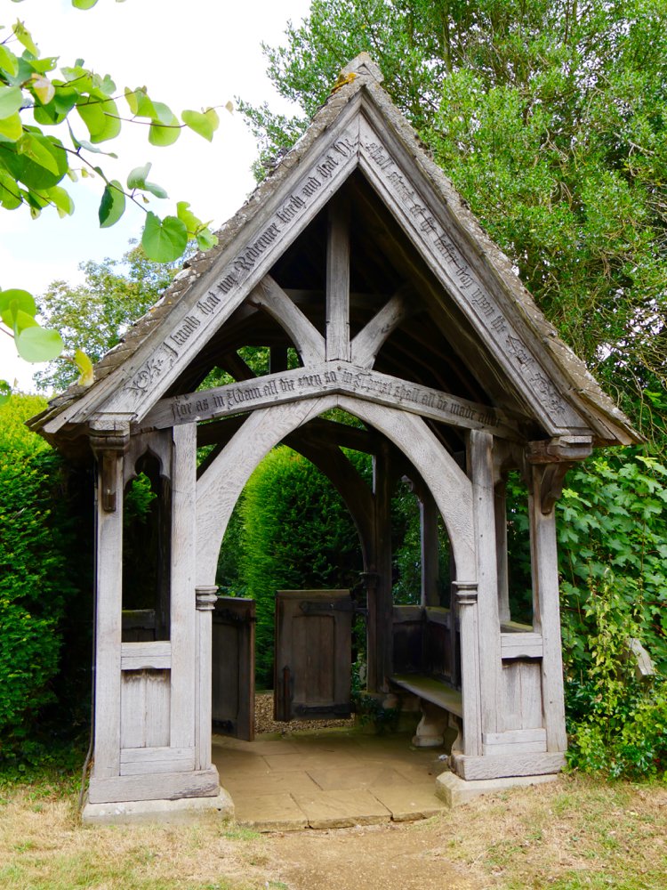The church lychgate built from oak with a little chestnut here and there and then topped with stone roofing.
