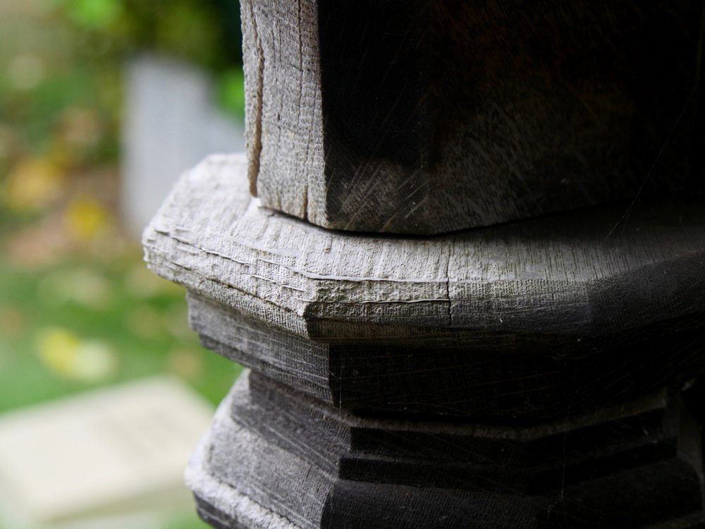 Weathered silver and shimmering in parts unseen. 