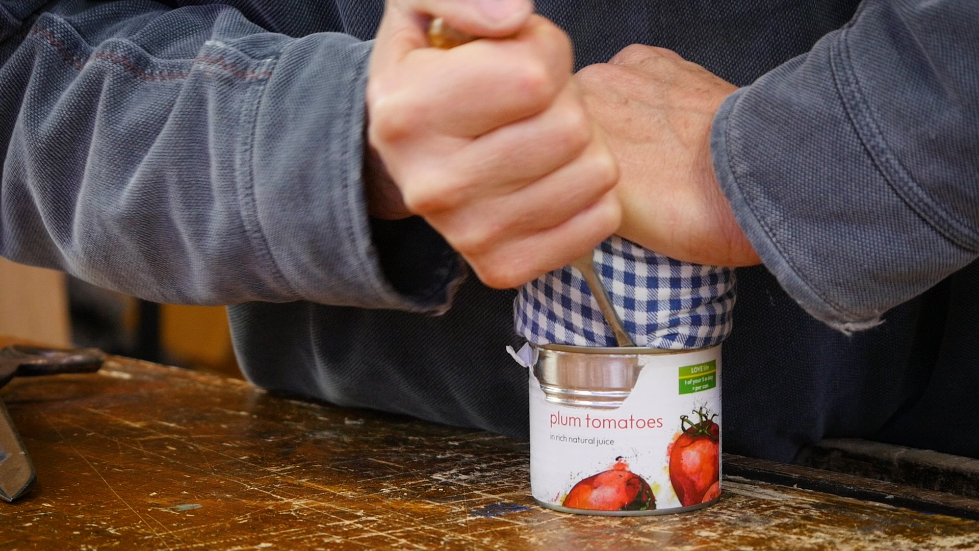 fitting the rag in the can